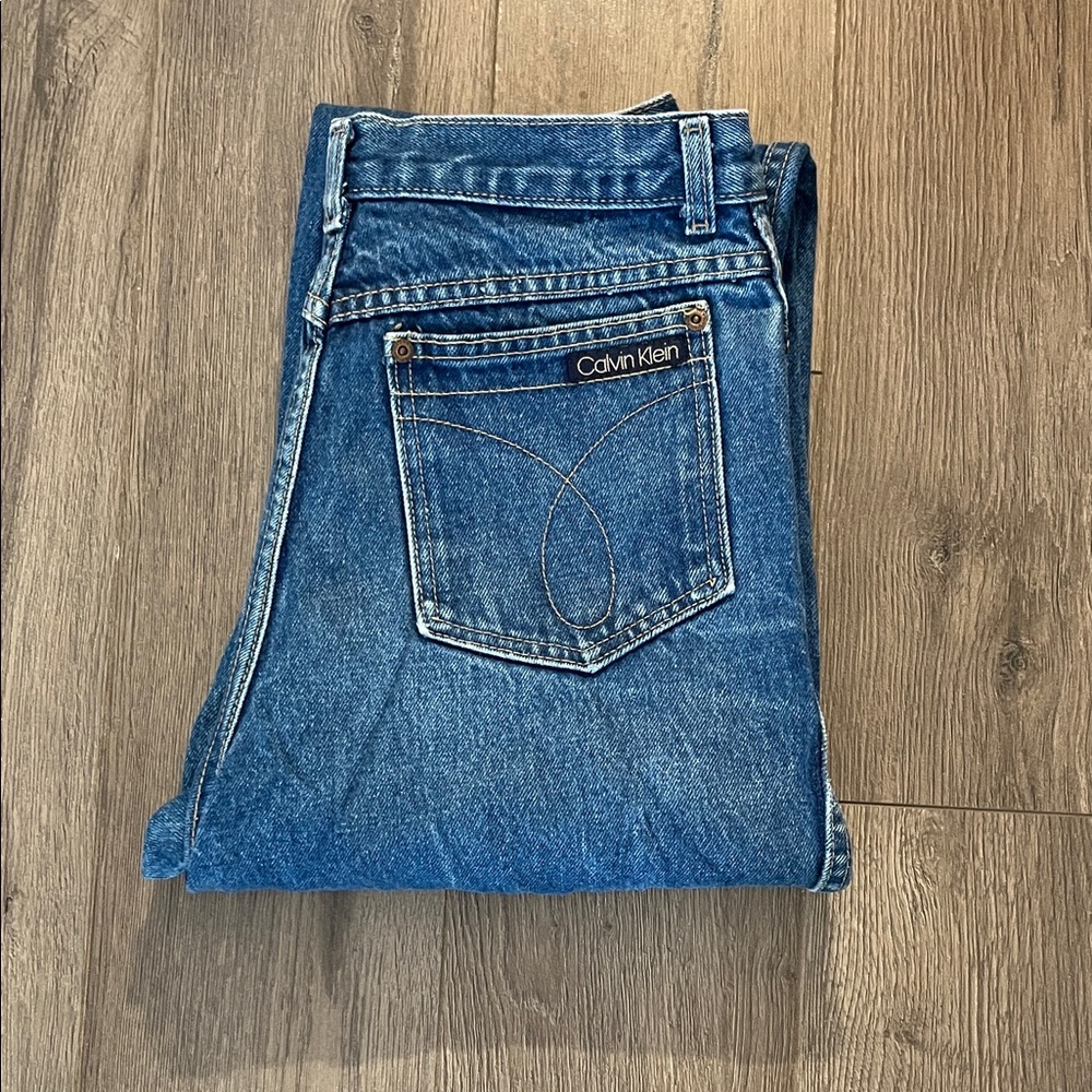 Vintage Calvin Klein denim jeans in a medium blue wash.